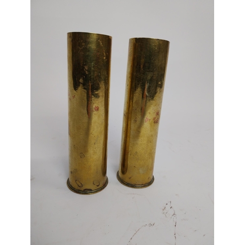 102 - Two WWI brass shells. {21 cm H x 6 Dia.}