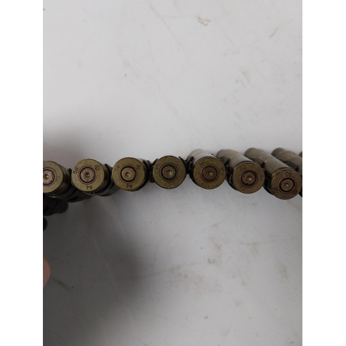 120 - Brass bullet belt. {72 cm L}.