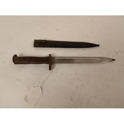 121 - Early 20th C. rifle bayonet in metal scabbard. {39 cm L}.