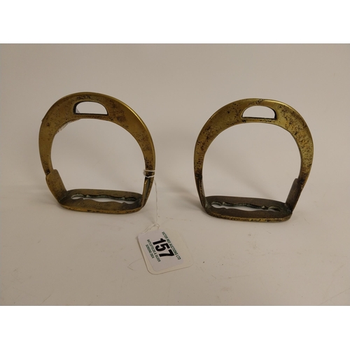 157 - Two 19th C. brass stirrups. {12 cm H x 12 cm W x 4 cm D}.