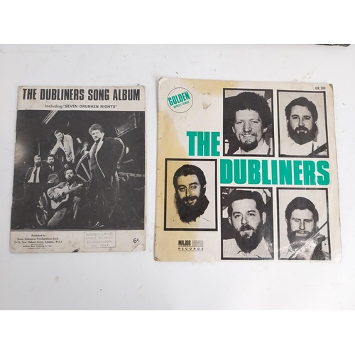 176 - Dubliners Memorabilia  - The Dubliners Album, song sheet and  two framed black and white prints. {34... 