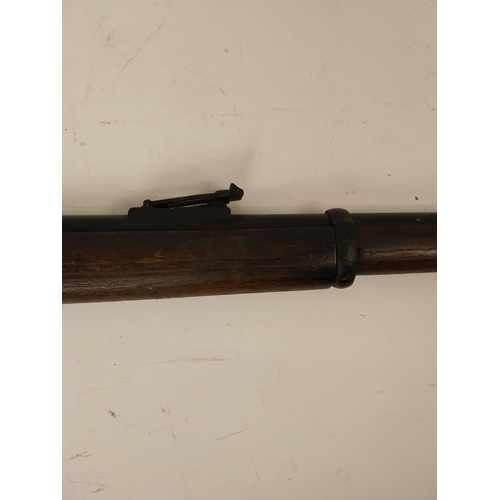 187 - Late 19th. C. single barrel under lever rifle with sight, stock in need of repair, ramrod missing. S... 