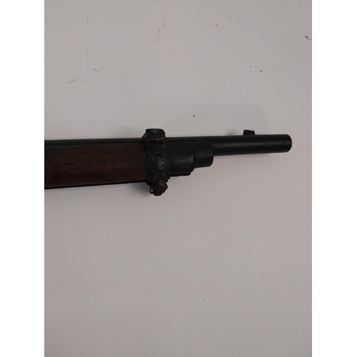 187 - Late 19th. C. single barrel under lever rifle with sight, stock in need of repair, ramrod missing. S... 