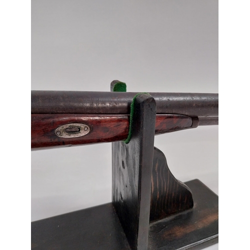 188 - 19th.C. percussion capped side-by-side double barrel shotgun, with walnut stock, chased action, ramr... 