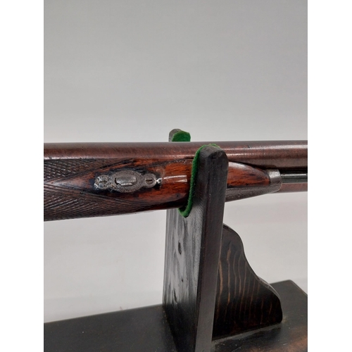 190 - 19th.C. percussion capped side-by-side double barrel shotgun, with walnut stock, chased action with ... 