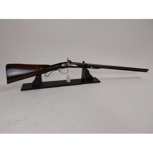 193 - 19th.C. percussion capped side-by-side double barrel shotgun, with walnut stock, chased action, dama... 