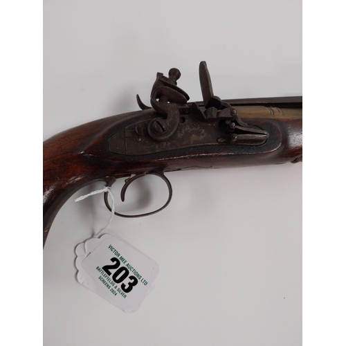 203 - 19th. C. flintlock pistol with brass barrel with sprung bayonet, walnut stock, chased action, ramrod... 