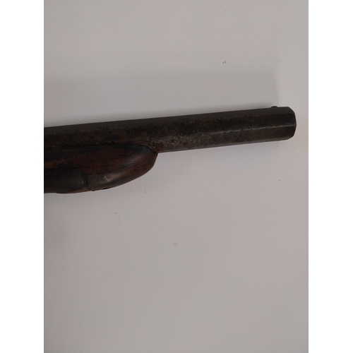 228 - 19th C. percussion capped pistol with hexagonal barrel. {33 cm L x 14 cm H}.