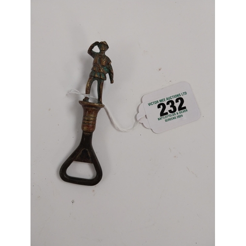 232 - WWI brass and metal bottle opener in the form of a Soldier. {12 cm H x  3 cm Dia.}