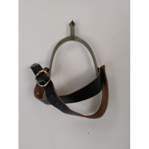 234 - Two white metal stirrups. {18 cm H x 9 cm W}.