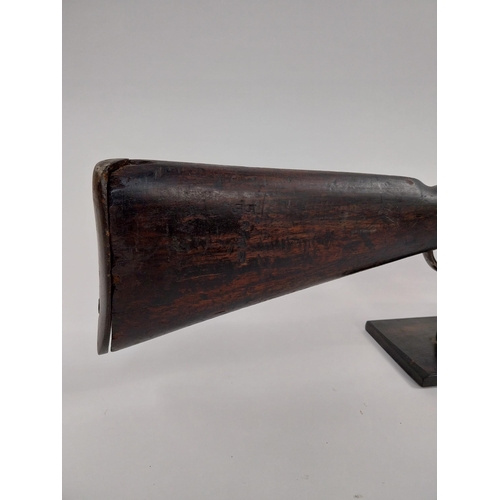 235 - Late 19th. C. single barrel under lever rifle with sight and ramrod.{ 126cm L overall. }.