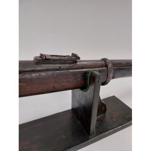 235 - Late 19th. C. single barrel under lever rifle with sight and ramrod.{ 126cm L overall. }.