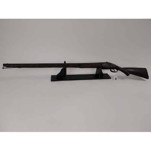 236 - 19th. C. single barrel shotgun with ramrod. Barrel stamped 206. { 130.5cm L overall. }.