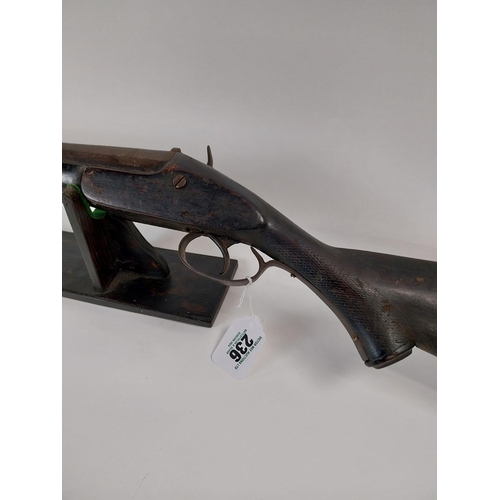 236 - 19th. C. single barrel shotgun with ramrod. Barrel stamped 206. { 130.5cm L overall. }.