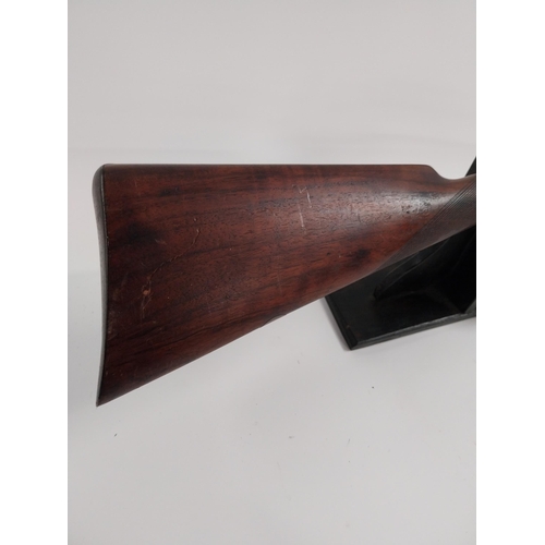 238 - De - commissioned side by side hammer double barrel shotgun, with walnut stock. Stamped T Bland & So... 