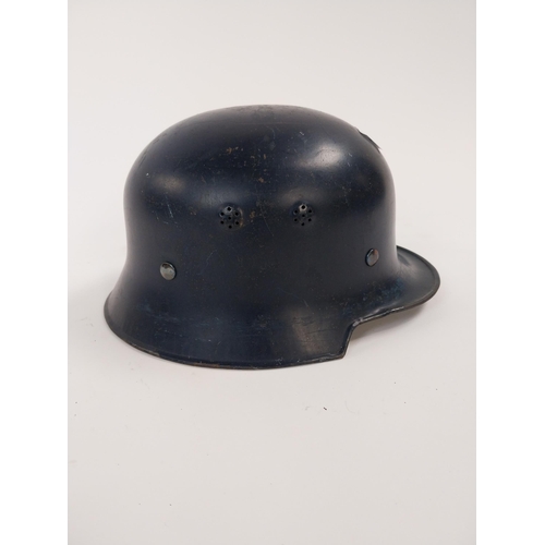 247 - WWII. German Police helmet with leather liner.