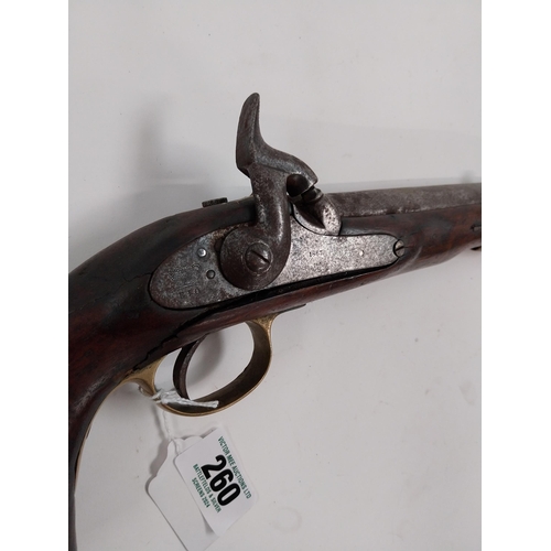 260 - 19th. C. percussion cap pistol with walnut stock, brass mounts metal ramrod and lanyard ring. Stampe... 