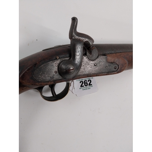 262 - 19th. C. percussion cap pistol with brass mounts, ramrod missing. { 44cm L overall. }.