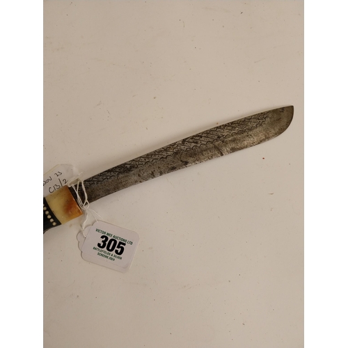 305 - Toraja Indonesian bone and ebony handled knife. {46 cm L}.