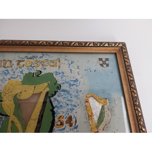 307 - Framed An Tostal Ireland on reverse painted glass sign. {34 cm H x 50 cm W}.