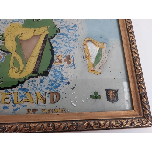 307 - Framed An Tostal Ireland on reverse painted glass sign. {34 cm H x 50 cm W}.