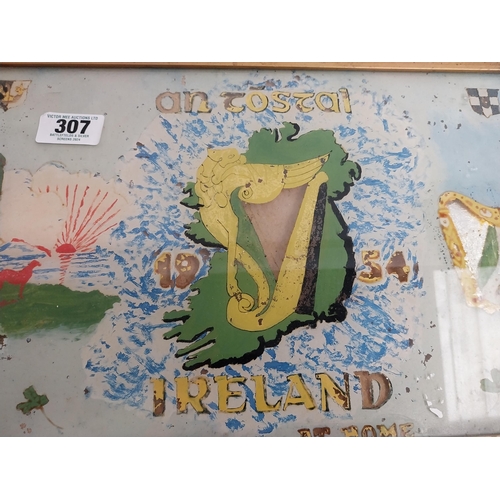 307 - Framed An Tostal Ireland on reverse painted glass sign. {34 cm H x 50 cm W}.