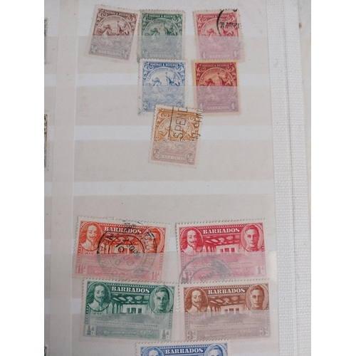 320 - Three Books of British Commonwealth stamps 1900-1970 some over stamped with WAR TAX .