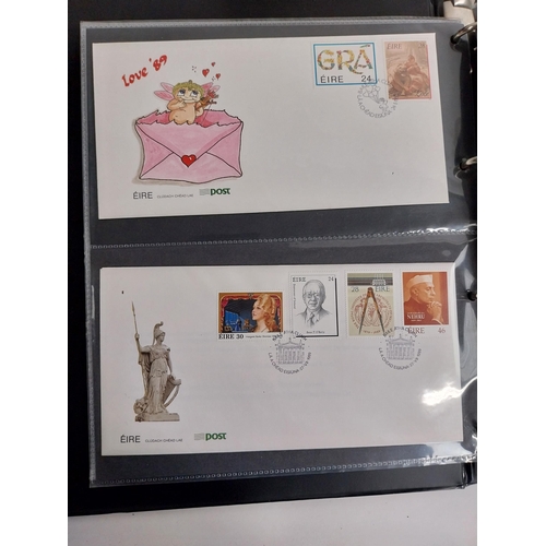 329 - Two Irish, British and Commonwealth first day covers and unfranked stamps in albums.