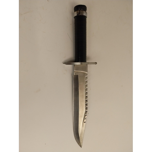 42 - Rambo First Blood Part 1 Dagger with serrated edge with leather scabbard.