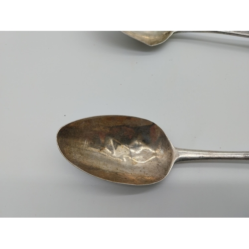 465 - Pair of Irish silver serving spoons. Hallmarked in Dublin Maker John Pittar. Wt: 118grms.