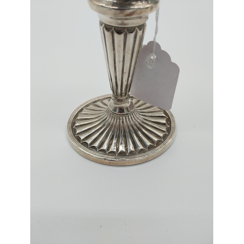 501a - Silver plate candlestick in the Adam's style. {18 cm H x 10 cm W x 8 cm D}.