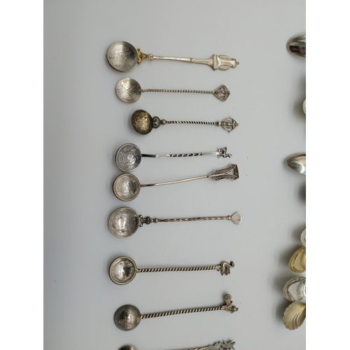 517 - Collection of 9 silver coin spoons and collection of crested teaspoons.