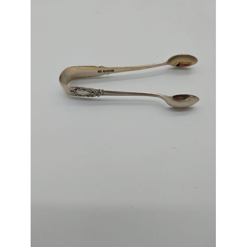 518 - Set of five English silver teaspoons, sugar tongs. Hallmarked in Sheffield 1904 Maker James Deakin &... 