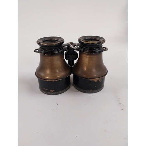 66 - Pair of WWI binoculars. {9 cm H x 15 cm W}