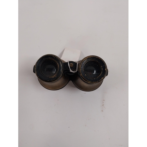 66 - Pair of WWI binoculars. {9 cm H x 15 cm W}