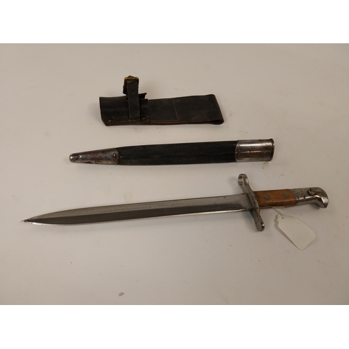 79 - Early 20th C. Elsener Schwyz Victoria Rifle Bayonet in original leather scabbard. {45 cm L}.