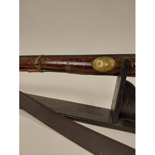 8 - 19th C. percussion capped rifle. {146 cm L}.