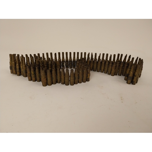 80 - Brass rifle bullet belt. {71 cm L}.