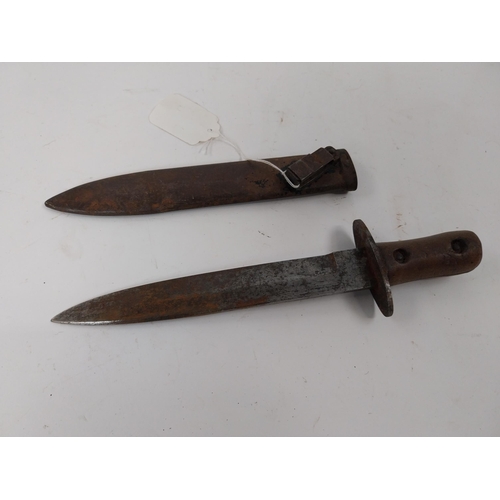 81 - WWI military dagger with original metal scabbard. {29 cm L}