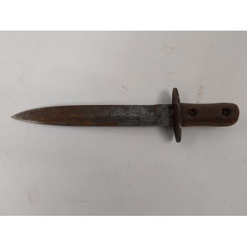 81 - WWI military dagger with original metal scabbard. {29 cm L}