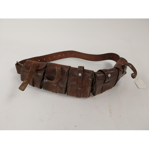 84 - Early 20th C. leather bullet belt. {51 cm L}.