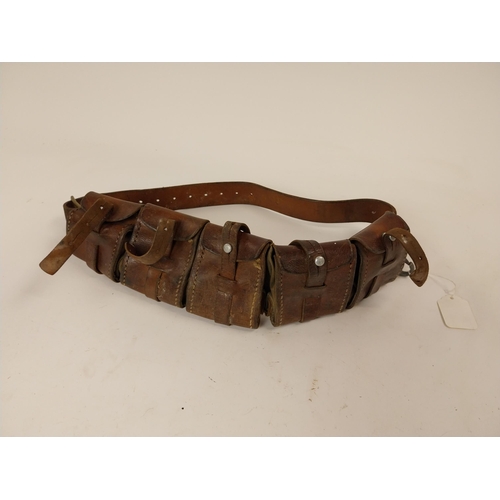 84 - Early 20th C. leather bullet belt. {51 cm L}.