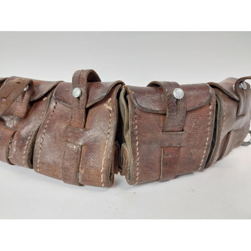 84 - Early 20th C. leather bullet belt. {51 cm L}.