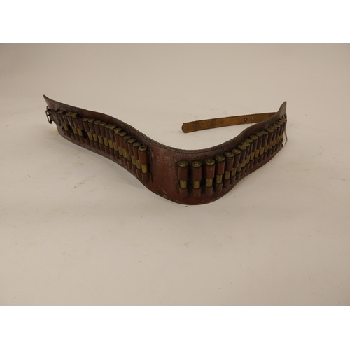 94 - 20th C. leather belt with blank bullets. {94 cm W}