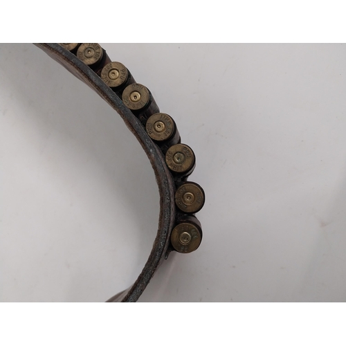 94 - 20th C. leather belt with blank bullets. {94 cm W}