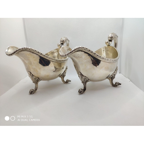 429 - Rare pair of George II Irish silver sauce boats , the deep oval bellied form with applied gadroon bo... 