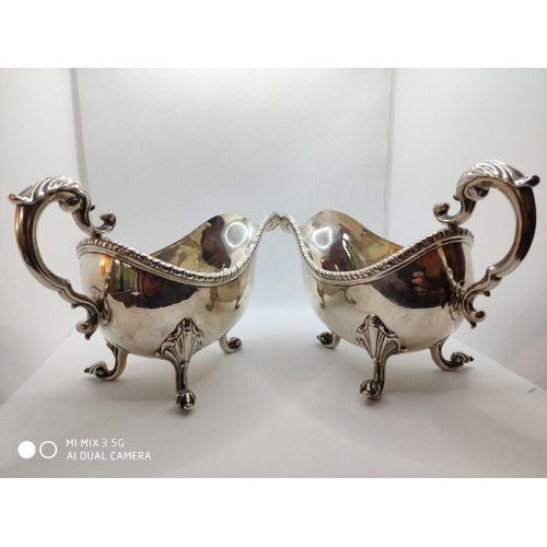 429 - Rare pair of George II Irish silver sauce boats , the deep oval bellied form with applied gadroon bo... 