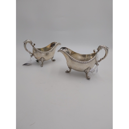 429 - Rare pair of George II Irish silver sauce boats , the deep oval bellied form with applied gadroon bo... 