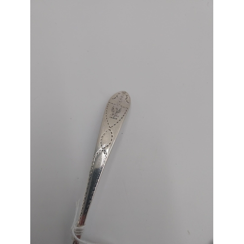 432 - Irish Georgian silver sauce ladle with bright cut Celtic point decoration, the cartouche engraved wi... 