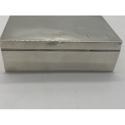 446 - English silver cigarette box. Hallmarks rubbed. Engraved with a rectangular block enclosing a diamon... 